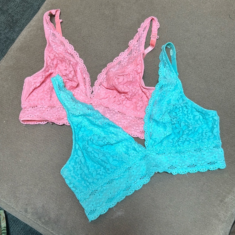 Pair of Wacoal lace bralettes.